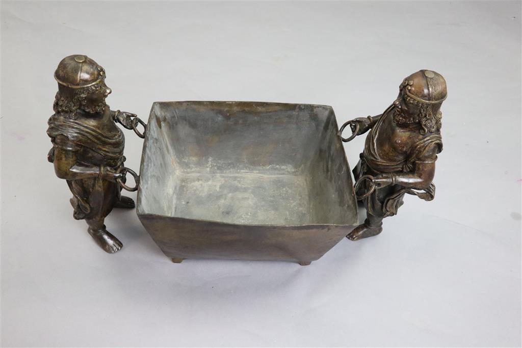 A massive Chinese bronze figural censer, fangding, 17th century or later, 38cm high, 63cm wide